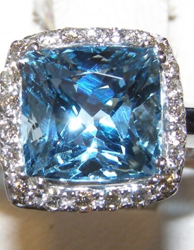 Color Symphony's Aquamarine Diamond Halo Ring